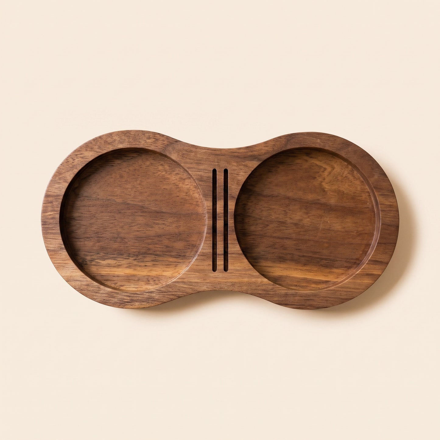 Walnut tamping station top-down view showing the two 60mm cups
