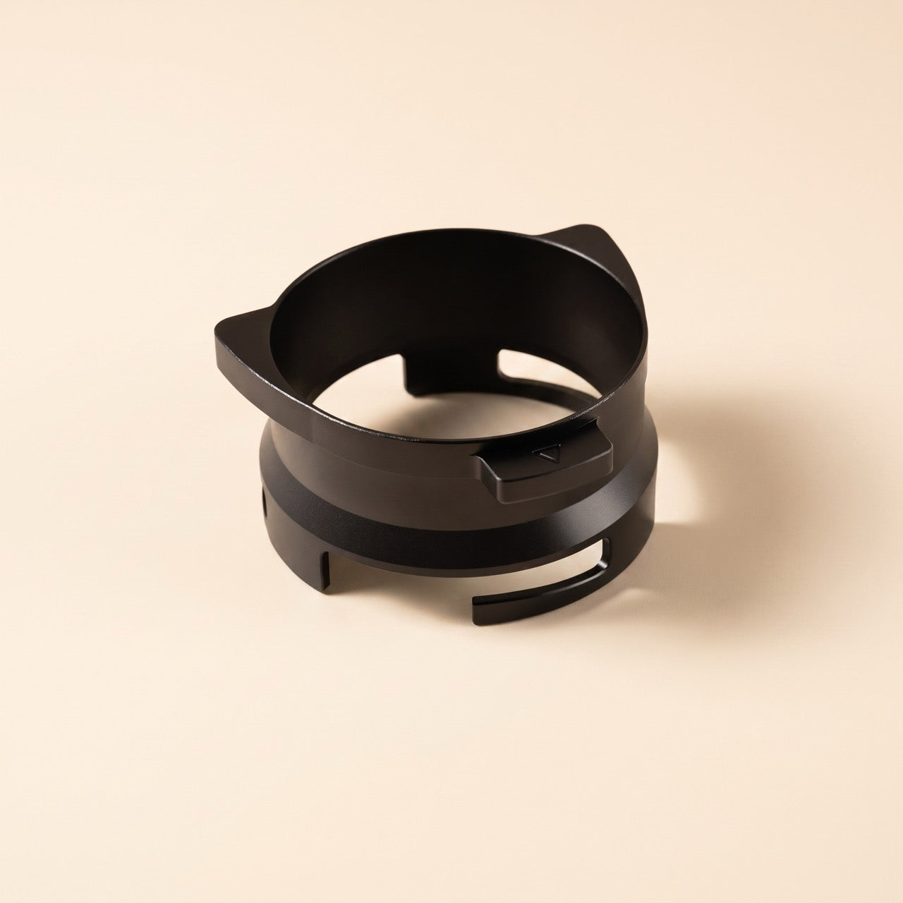 Dosing funnel for 54mm Breville portafilters, front view on a neutral background
