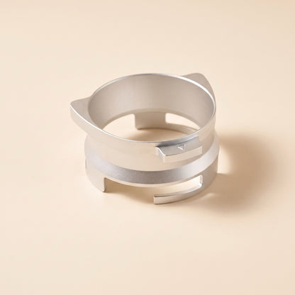Stainless steel dosing funnel variant, front view on a neutral background