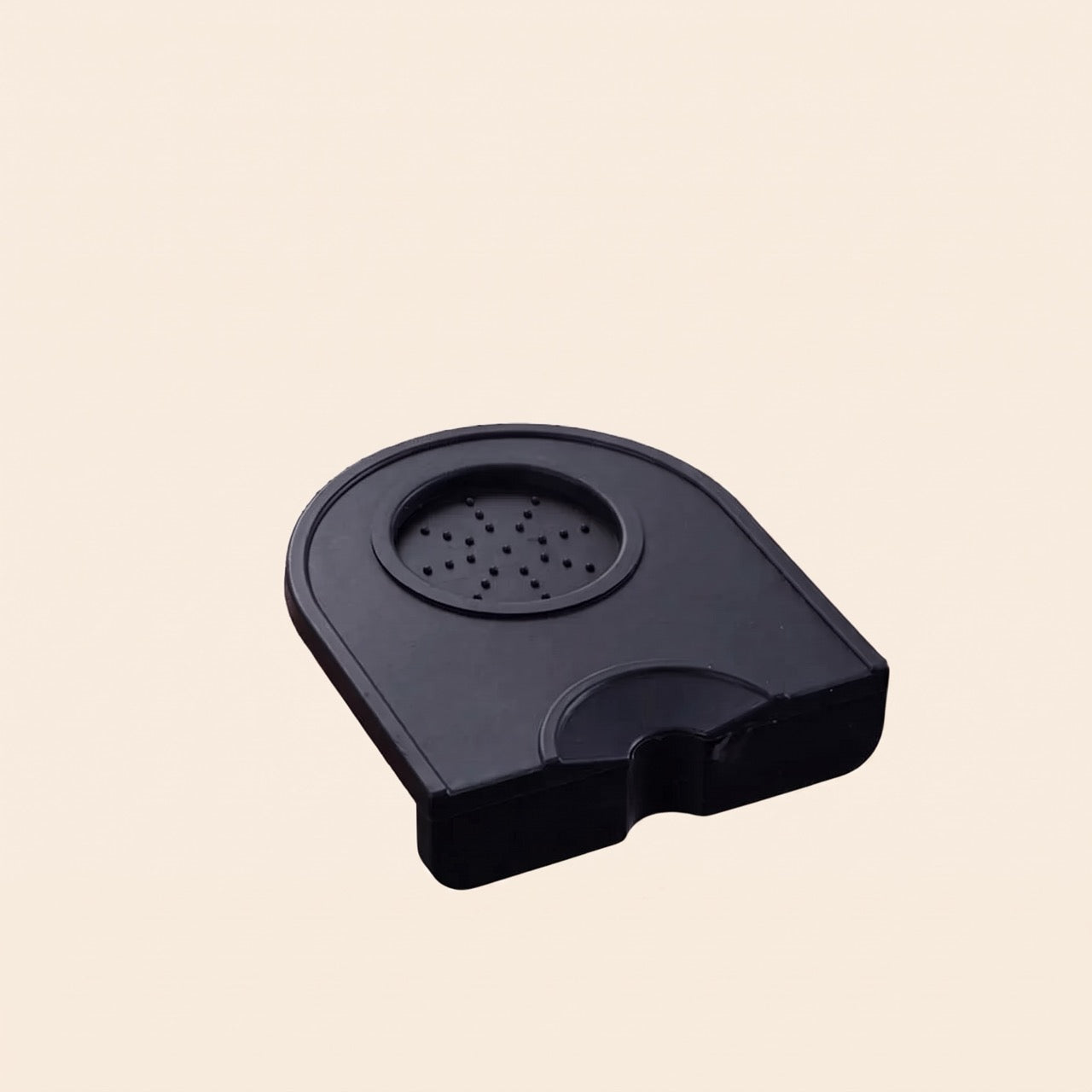 Silicone corner tamping mat, Small, top-down view showing one well