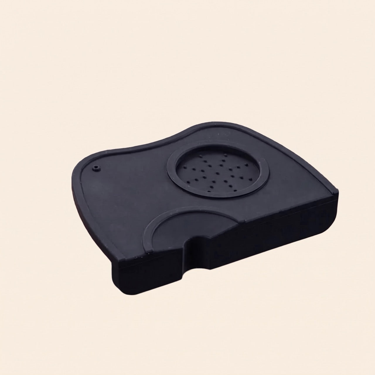 Close-up of the rear lip that grips the bench edge on the tamping mat