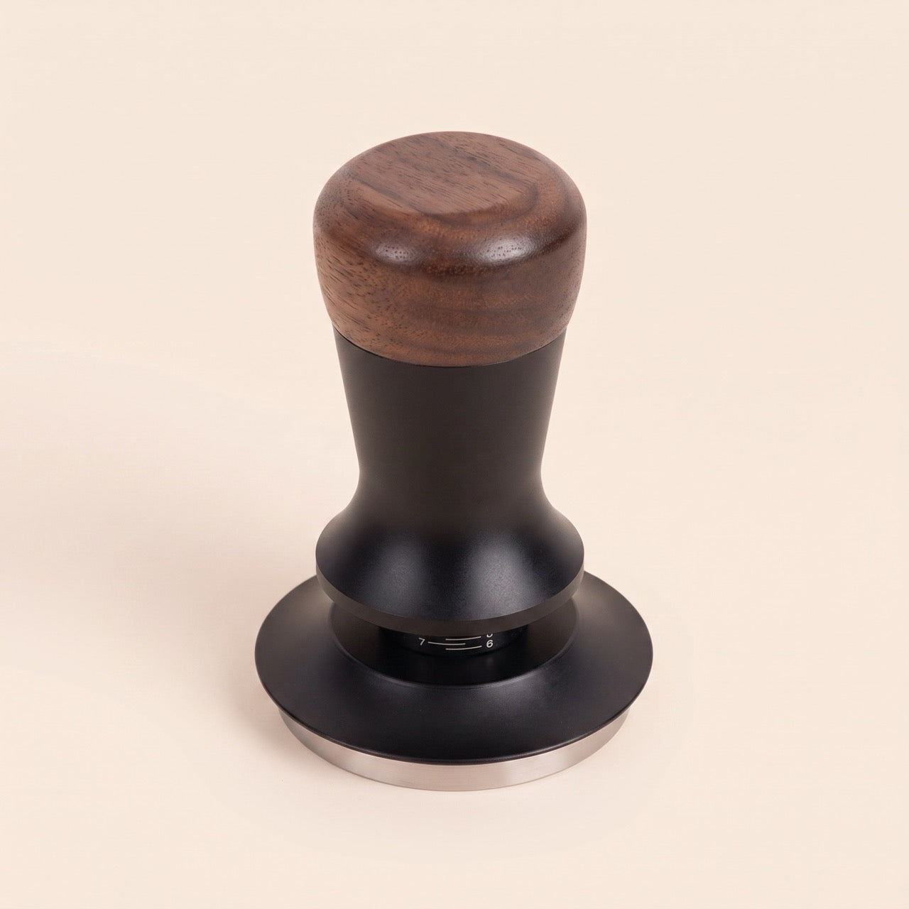 Calibrated tamper flat base variant, close-up of the mirror-polished steel face