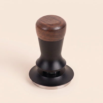 Calibrated tamper flat base variant, close-up of the mirror-polished steel face