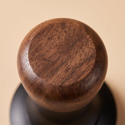 Calibrated tamper in use, tamping a dosed portafilter basket
