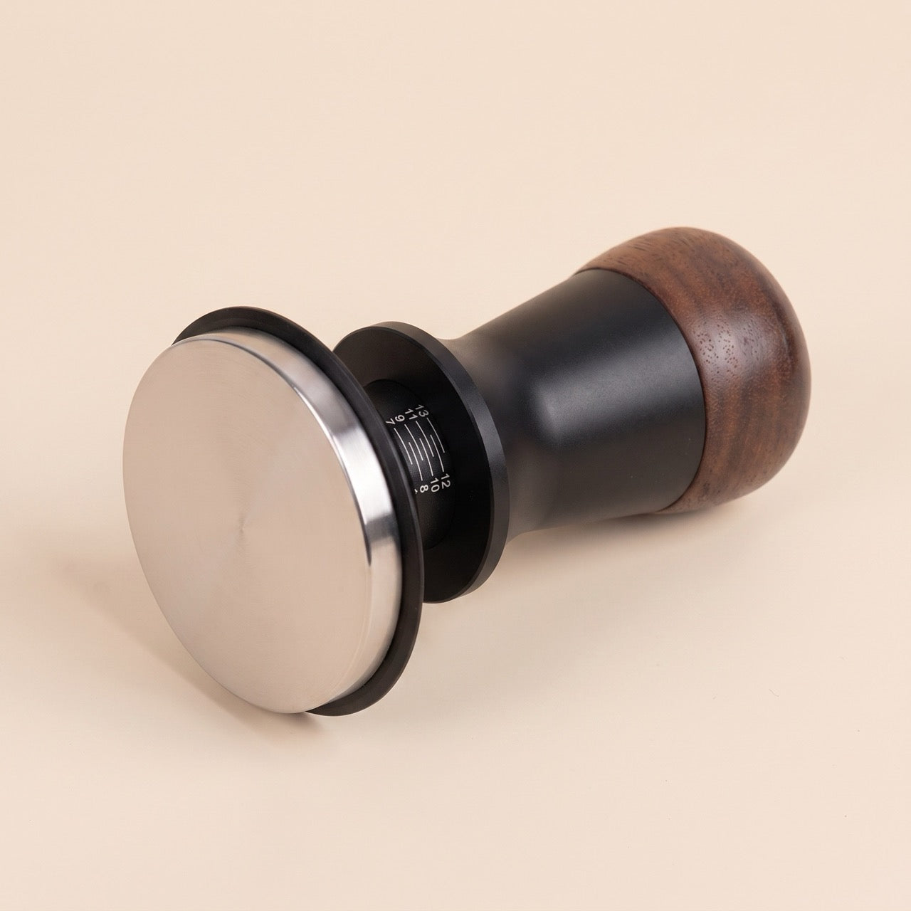 Calibrated tamper grooved base variant, close-up of the textured steel face