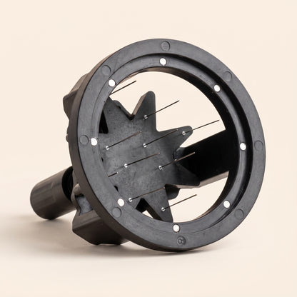 Close-up of the rotary WDT tool's fine stainless needle star head