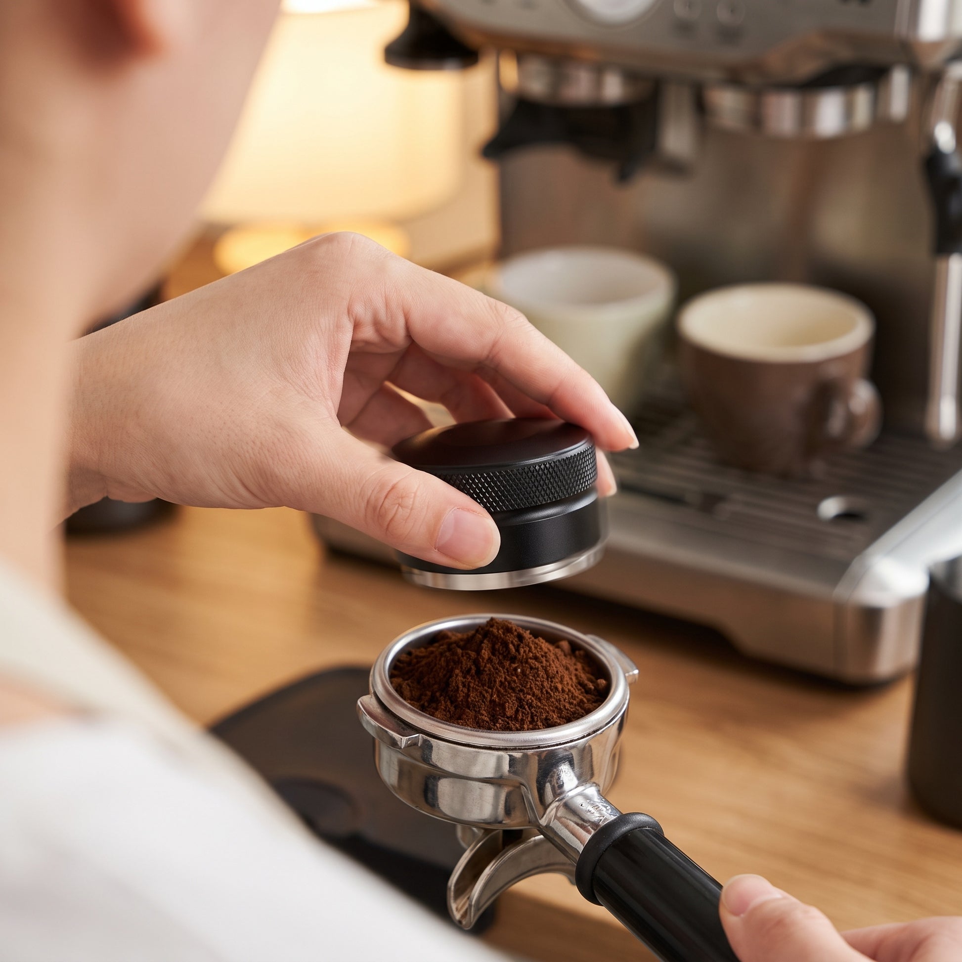 Close-up of the three angled slopes on the coffee distributor face