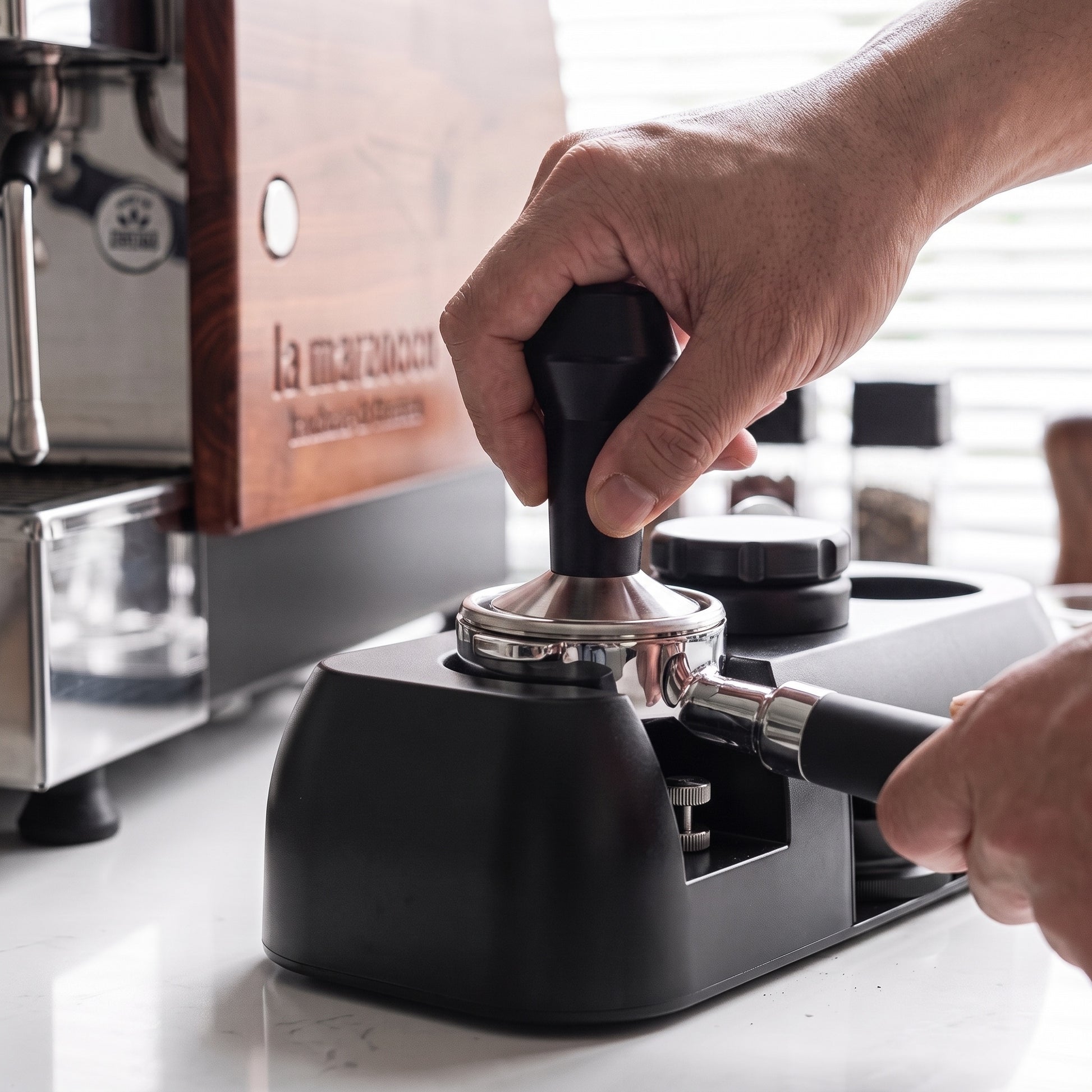ABS tamping station with the 51/53/54mm insert fitted into the 58mm cradle