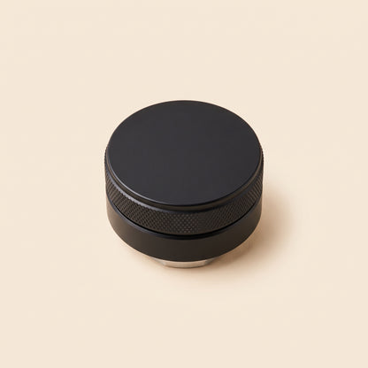Close-up of the knurled grip band on the coffee distributor body