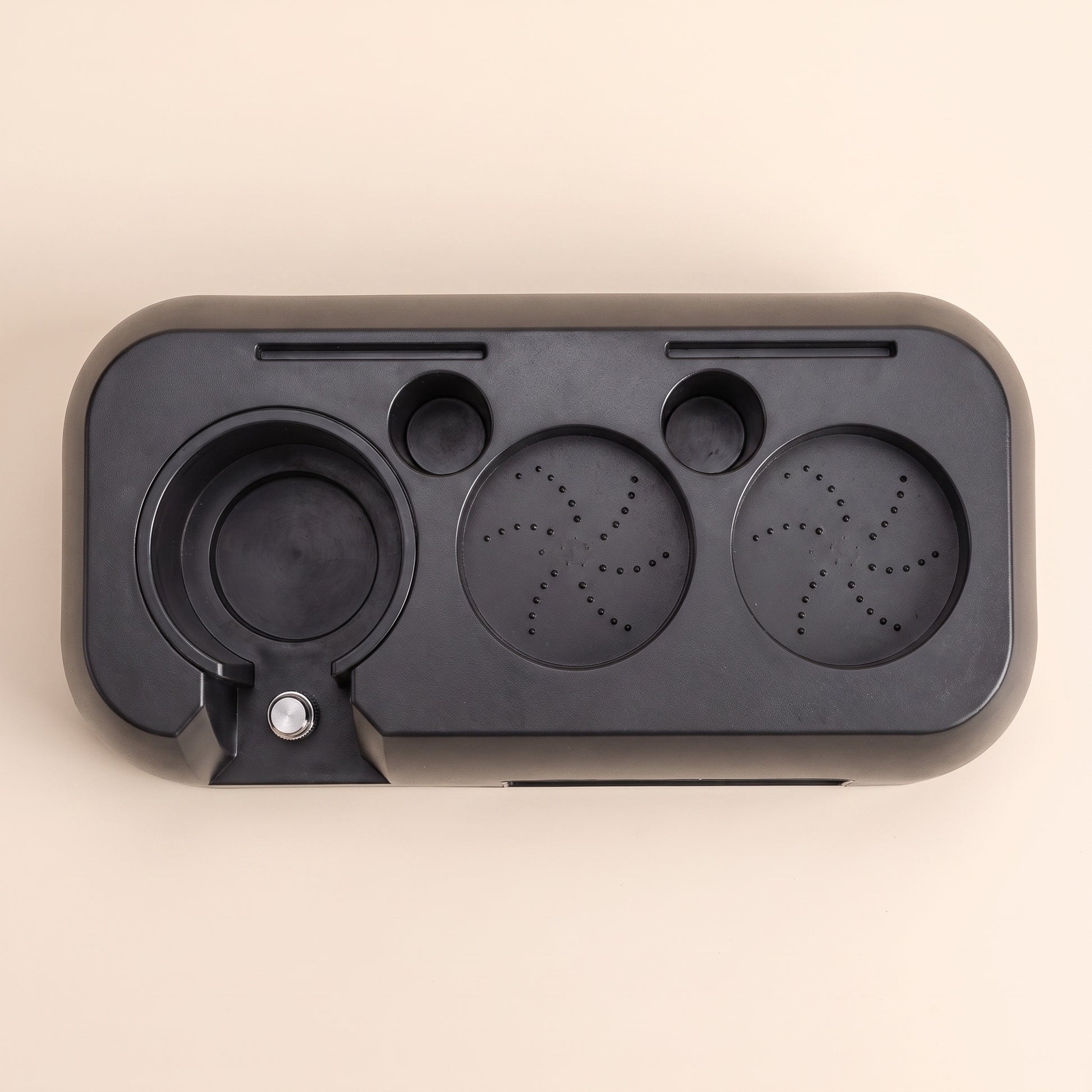 Close-up of the silicone feet on the base of the ABS tamping station