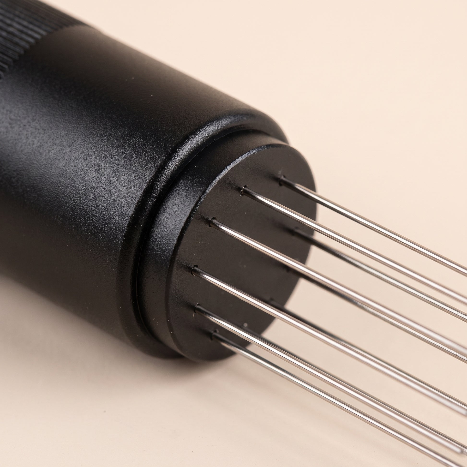 Close-up of the 8 fine stainless steel needles on the WDT tool head